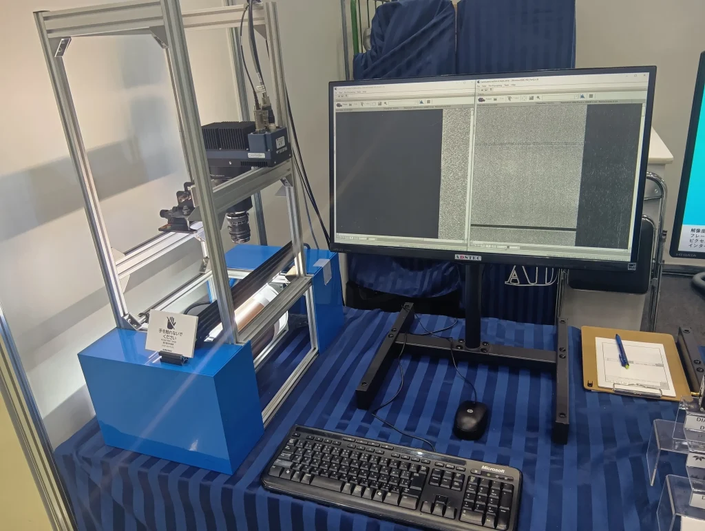 新機能性材料展2026で実演したTeledyne DALSA Linea HS 2による高速ラインスキャン撮像デモ